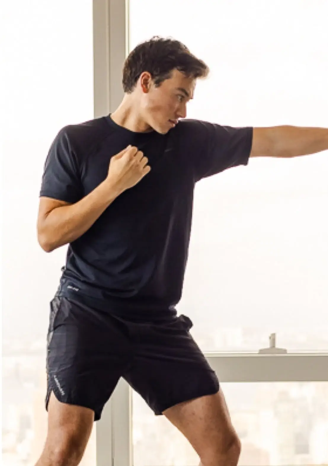 man in a jabbing stance